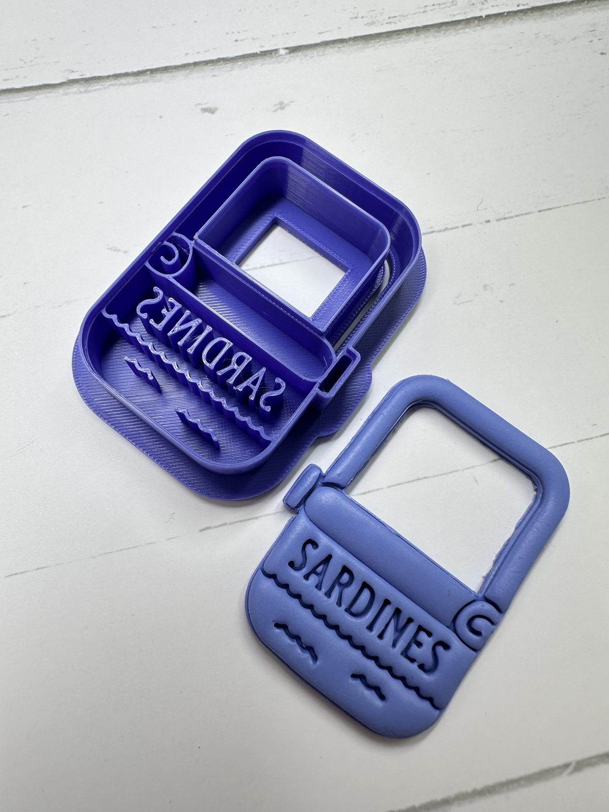 Sardine tin imprint cutter with finished clay result